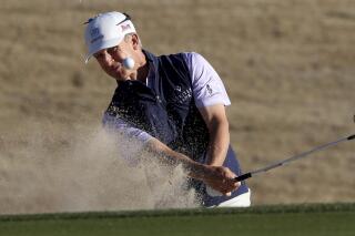 David Toms hits out of a bunker on the 18th hole during the second round of PGA Tour Champions' Cologuard Classic golf tournament in Tucson, Ariz., Saturday, March 4, 2023. (Kelly Presnell/Arizona Daily Star via AP)