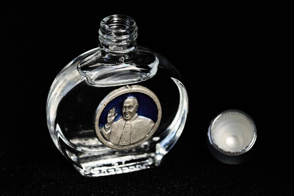 A religious souvenir depicting a Pope in Rome, Thursday, May 1, 2025. (AP Photo/Bernat Armangue)