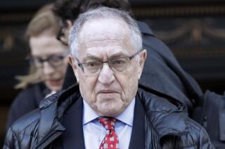 FILE - In this March 6, 2019 file photo, attorney Alan Dershowitz leaves Manhattan Federal Court in New York.  Dershowitz, in a lawsuit filed Wednesday, May 26, 2021, in Miami federal court, is suing Netflix for $80 million over his portrayal in the streaming service's “Filthy Rich” series about sex offender Jeffrey Epstein. (AP Photo/Frank Franklin II, File)