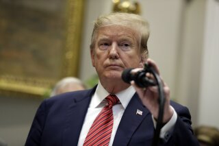 President Donald Trump speaks during a signing ceremony for an executive order on a "National Roadmap to Empower Veterans and End Veteran Suicide," in the Roosevelt Room of the White House, Tuesday, March 5, 2019, in Washington. (AP Photo/ Evan Vucci)