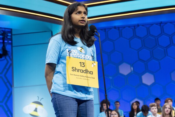 Shradha Rachamreddy, 14, of San Jose, Calif., spells a word during competition in the Scripps National Spelling Bee, in Oxon Hill, Md., Tuesday, May 28, 2024. (AP Photo/Jacquelyn Martin)