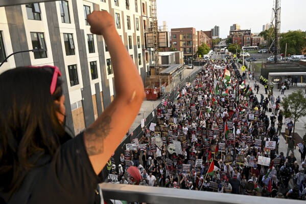Protesters march during a demonstration outside the Democratic National Convention Wednesday, Aug. 21, 2024, in Chicago. (AP Photo/Noah Berger)