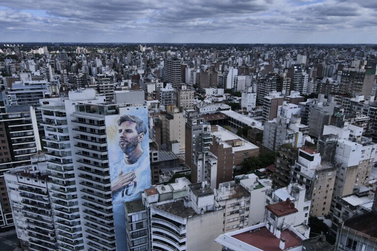 A mural of soccer player Lionel Messi covers a building in Rosario, Argentina, Monday, April 8, 2024. The birthplace of Messi and revolutionary Ernesto “Che” Guevara morphed about a decade ago into the country’s drug trafficking hub, as regional crackdowns pushed the trade south. (AP Photo/Natacha Pisarenko)