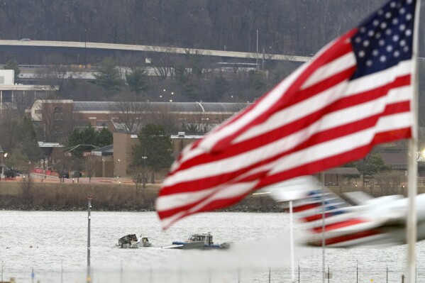 On Friday, January 31, 2025, a search effort was found around the location of a deadly aerial collision between the American Airlines Jet and the Army helicopter on the Potomac River near the Ronal Dragan Washington National Airport in Arlington, Virginia. Masu. American Airlines jets are lifted from the airport. (AP Photo/Alex Brandon)