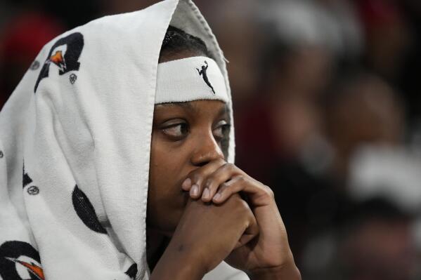 Phoenix Mercury guard Diamond DeShields (1) watches from the bench during the second half in Game 2 of a WNBA basketball first-round playoff series against the Las Vegas Aces, Saturday, Aug. 20, 2022, in Las Vegas. (AP Photo/John Locher)