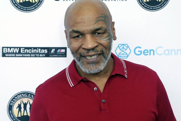 FILE - In this Aug. 2, 2019, file photo, Mike Tyson attends a celebrity golf tournament in Dana Point, Calif. Hulu on Thursday, Feb. 25, 2021, announced it has ordered “Iron Mike,” a limited series about the life of boxing great Mike Tyson. (Photo by Willy Sanjuan/Invision/AP, File)