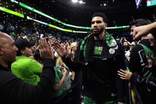 Jayson Tatum of the Boston Celtics walks off the court after the game in  2023