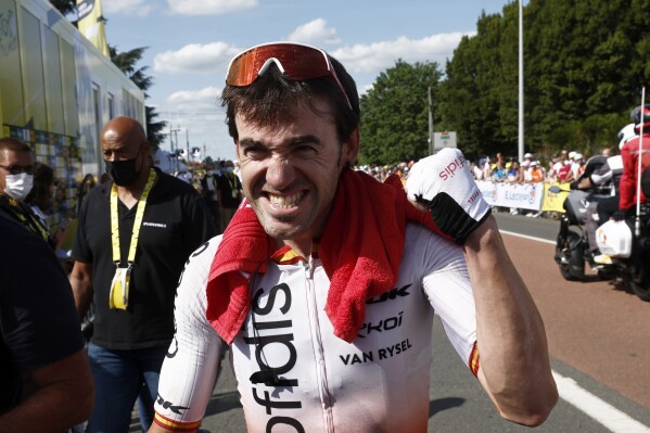 Spain's Ion Izagirre celebrates after winning the twelfth stage of the Tour de France cycling race over 169 kilometers (105 miles) with start in Roanne and finish in Belleville-en-Beaujolais, France, Thursday, July 13, 2023. (Benoit Tessier/Pool Photo via AP)