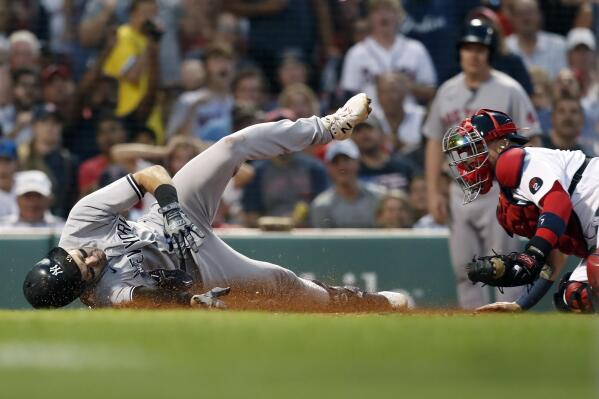 Boston Red Sox pitcher Matt Clement sits on the mound after being