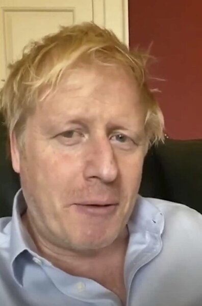 In this image taken from video of the TWITTER/@BorisJohnson, Britain's Prime Minister Boris Johnson speaks from self isolation which he has been in since contracting coronavirus, Friday April 3, 2020. British Prime Minister Boris Johnson has been admitted to a hospital with the coronavirus. Johnson’s office says he is being admitted for tests because he still has symptoms 10 days after testing positive for the virus.  (TWITTER/@BorisJohnson via AP)