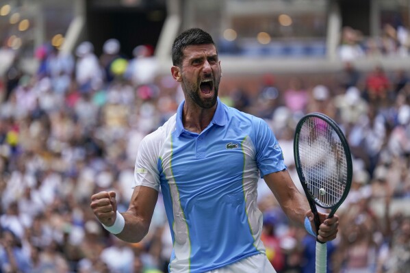 Novak Djokovic, of Serbia, reacts after defeating Taylor Fritz, of the United States, in the quarterfinals of the U.S. Open tennis championships, Tuesday, Sept. 5, 2023, in New York. (AP Photo/Seth Wenig)