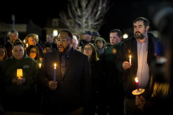 Newport News Councilman Elect John Eley, South District 3, speaks at a candlelight vigil in honor of Richneck Elementary School first-grade teacher Abby Zwerner at the School Administration Building in Newport News, Va., Monday, Jan. 9, 2023. Eley served on the Newport News School Board before being elected a councilman. Zwerner was shot and wounded by a 6-year-old student while teaching class on Friday, Jan. 6. (AP Photo/John C. Clark)