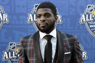 FILE - Montreal Canadiens defenseman P. K. Subban arrives at the NHL hockey All-Star game skills competition on Jan. 30, 2016, in Nashville, Tenn. Subban has become a full-time member of ESPN’s hockey team. Subban, who retired in September, has signed a three-year agreement with ESPN. (AP Photo/Mark Zaleski, File)