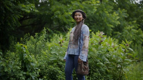 Yasmeen Bekhit, a 22-year-old graduate student, poses for a photograph in her Y2K-inspired outfit near her home in Manheim, Pa., Tuesday, June 27, 2023. If there’s one thing retailers will tell you, it’s that Gen Z hasn’t let up on early 2000s trends that are booming in popularity two decades later. (AP Photo/Matt Slocum)