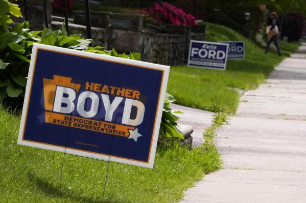 FILE - Campaign signs for Heather Boyd and Katie Ford are seen, Thursday, May 4, 2023, in Aldan, Pa. The two are running in a special election in the Philadelphia suburbs that will determine whether Democrats in the Pennsylvania House of Representatives will maintain control of the chamber or if Republicans will reclaim the majority control they held for 12 years until this January. (AP Photo/Matt Slocum, File)