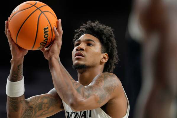 Cincinnati forward Dillon Mitchell (23) looks to shoot during an NCAA college basketball game against Howard, Sunday, Dec. 8, 2024, in Cincinnati. (AP Photo/Jeff Dean, FIle)