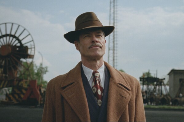 This image released by A24 shows Guy Pearce in a scene from "The Brutalist." (Lol Crawley/A24 via AP)