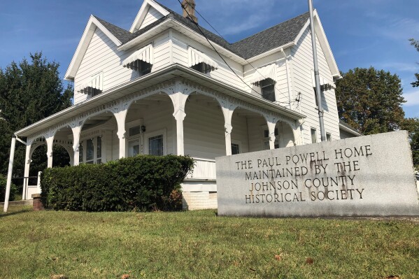 FILE - A sign marks he Paul Powell Home and Museum, Oct. 8, 2020 photo in Vienna, Ill. For more than half a century, a Powell-established $250,000 trust sustained his legacy, for better or worse. But the account that maintained his birthplace as a museum will soon run dry. (AP Photo/John O'Connor, File)