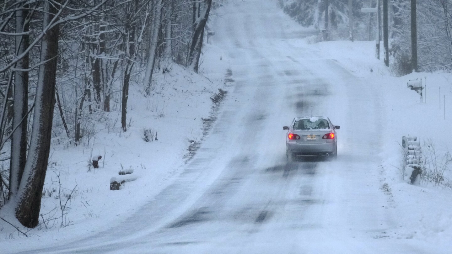 Winter storm brings heavy snow and freezing rain to New England
