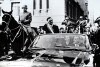 FILE - Chilean President Salvador Allende salutes from an open vehicle as General Augusto Pinochet rides on horseback at left in Santiago, Chile, May 21, 1972. (AP Photo/File)