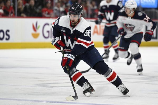 Washington Capitals defenseman Erik Gustafsson (56) in action during the first period of an NHL hockey game against the Columbus Blue Jackets, Sunday, Jan. 8, 2023, in Washington. (AP Photo/Terrance Williams)