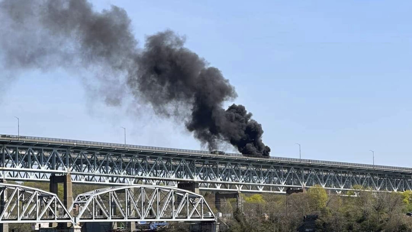 Driver charged with negligent homicide in fiery crash that shut down Connecticut highway bridge