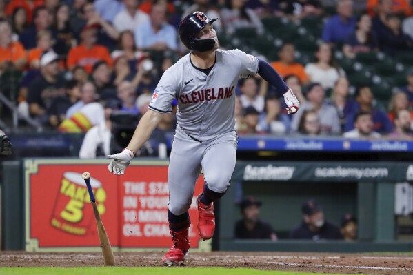 Cleveland Guardians' designated hitter Will Brennan flips his bat as he watches his home run against the Houston Astros during the fifth inning of a baseball game Wednesday, May 1, 2024, in Houston. (AP Photo/Michael Wyke)
