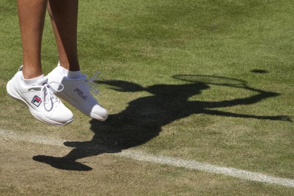 Ann Li of the United States serves the ball to Coco Gauff of the United States during their WTA tournament round of sixteen tennis match in Berlin, Germany, Wednesday, June 15, 2022. (AP Photo/Michael Sohn)