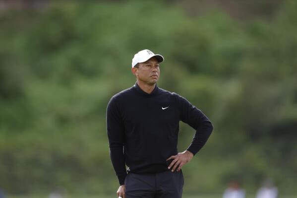 Tiger Woods waits for his turn in play during the second round of the Genesis Invitational golf tournament at Riviera Country Club, Friday, Feb. 17, 2023, in the Pacific Palisades area of Los Angeles. (AP Photo/Ryan Kang)