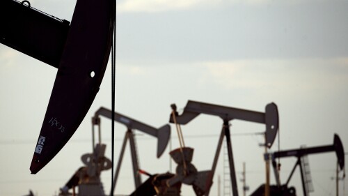 FILE - Pump jacks work in a field near Lovington, N.M., April 24, 2015. The Biden administration is proposing new rules for the nation’s oil and gas leasing program that would raise costs for energy companies to drill on public lands and strengthen requirements for cleaning up old wells where drilling is completed or abandoned. (AP Photo/Charlie Riedel, File)