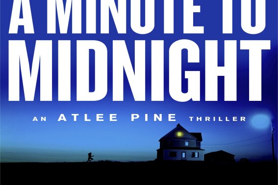 This cover image released by Grand Central Publishing shows "A Minute to Midnight," by David Baldacci. (Grand Central Publishing via AP)
