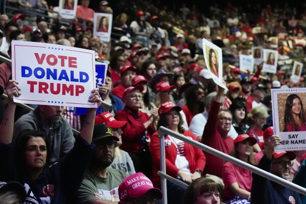 Supporters arrive before Republican presidential candidate former President Donald Trump speaks at a campaign rally Saturday, March 9, 2024, in Rome Ga. (AP Photo/Mike Stewart)