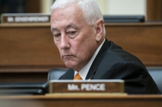 FILE - Rep. Greg Pence, R-Ind., listens during a House Foreign Affairs Committee hearing, Oct. 23, 2019, on Capitol Hill in Washington. Pence, the older brother of former Vice President Mike Pence, said Tuesday, Jan. 9, 2024, that he will not seek reelection this year to a fourth term, becoming the latest House member to announce that they won't run for reelection. (AP Photo/J. Scott Applewhite, File)