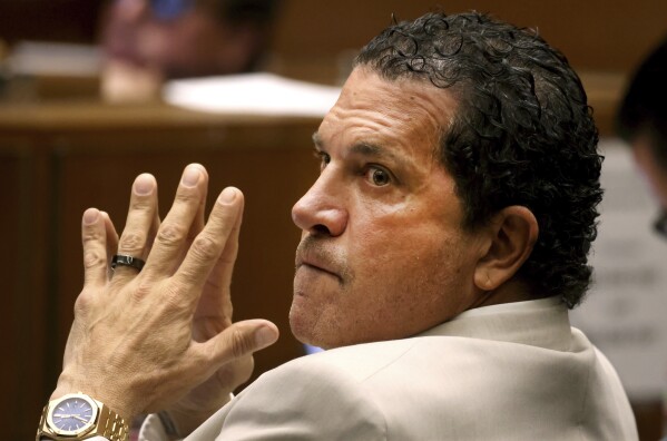 Defense attorney Joe Tacopina listens to opening remarks from the prosecuting attorney during the trial of his client, Rakim Mayers, aka A$AP Rocky, at the Clara Shortridge Foltz Criminal Justice Center in downtown Los Angeles, Friday, Jan. 24, 2025. (Genaro Molina/Los Angeles Times via AP, Pool)
