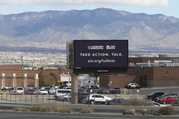 A billboard flashes a message as part of a new statewide Alzheimer's awareness campaign that includes digital advertisements around in Albuquerque, N.M., Wednesday, March 12, 2025. (AP Photo/Susan Montoya Bryan)