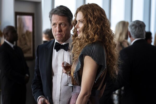 This image released by HBO shows Hugh Grant, left, and Nicole Kidman in a scene from "The Undoing." The Nielsen company said some three million people watched on Sunday to learn the mystery's resol...