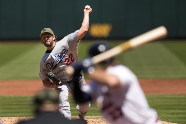 Los Angeles Dodgers starting pitcher Clayton Kershaw throws during the second inning of a baseball game against the St. Louis Cardinals Sunday, May 21, 2023, in St. Louis. (AP Photo/Jeff Roberson)