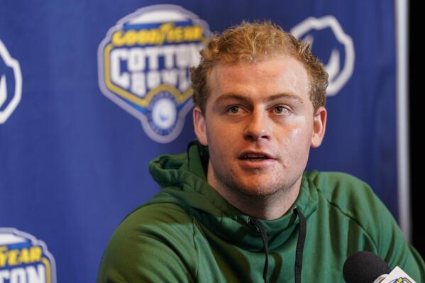 Tulane quarterback Michael Pratt (7) speaks during a news conference for the Cotton Bowl NCAA college football game, Thursday, Dec. 29, 2022, in Arlington, Texas. Tulane faces Southern California in the Cotton Bowl on Monday, Jan. 2, 2023. (AP Photo/Sam Hodde)