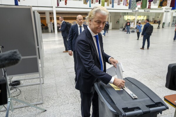 Anti-Islam lawmaker Geert Wilders of the PVV, or Party for Freedom, casts his ballot for the European election in The Hague, Netherlands, Thursday, June 6, 2024. Voters in the European Union are set to elect lawmakers starting Thursday June 6th for the bloc's parliament. (AP Photo/Peter Dejong)