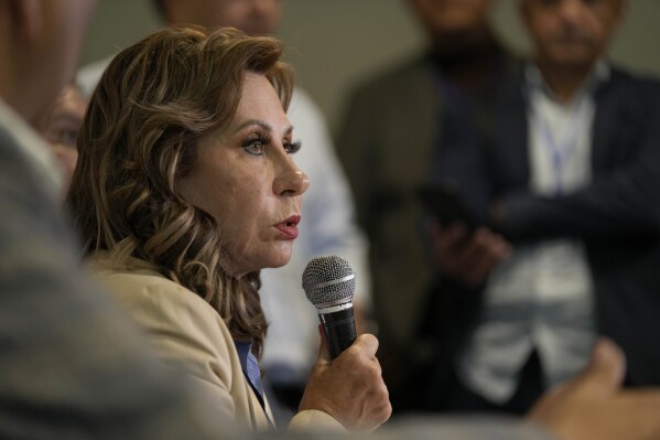 Sandra Torres, presidential candidate with the National Unity of Hope party (UNE), speaks during a press conference before the closing of the polls during general elections in Guatemala City, Sunday, June 25, 2023. (AP Photo/Moises Castillo )