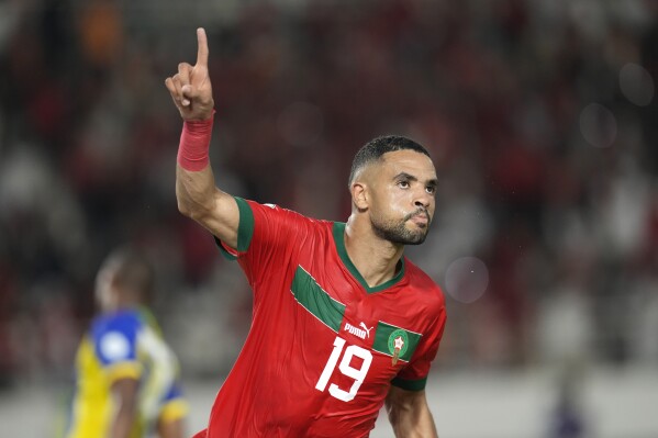 Morocco's Youssef En-Nesyri celebrates after scoring his side's third goal during the African Cup of Nations Group F soccer match between Morocco and Tanzania at the Laurent Pokou stadium in San Pedro, Ivory Coast, Wednesday, Jan. 17, 2024. (AP Photo/Themba Hadebe)
