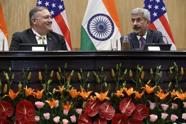 U.S. Secretary of State Mike Pompeo, left, attends a news conference with Indian counterpart Subrahmanyam Jaishankar, at the Foreign Ministry in New Delhi, India, Wednesday, June 26, 2019. Pompeo held meetings in India's capital on Wednesday amid growing tensions over trade and tariffs that has strained the partners' ties. (AP Photo/Jacquelyn Martin, Pool)