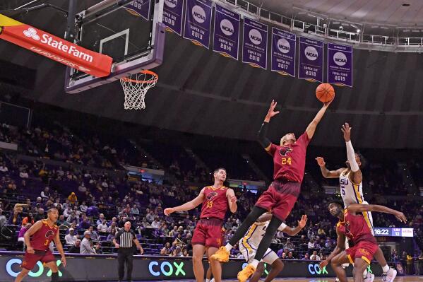 Louisiana-Monroe guard/forward Russell Harrison (24) pulls in the rebound in front of LSU forward Mwani Wilkinson (5) during an NCAA college basketball game Tuesday, Nov. 9, 2021, at the LSU PMAC in Baton Rouge, La. (Hilary Scheinuk/The Advocate via AP)