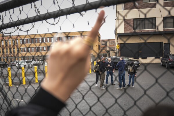 Protestors demand the release of Newark Mayor Ras Baraka after his arrest at an ICE detention prison, Friday, May 9, 2025, in Newark, N.J, (AP Photo/Angelina Katsanis)