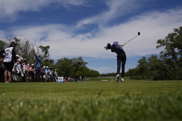 Akshay Bhatia hits his tee shot on the ninth hole during the second round of the Texas Open golf tournament, Friday, April 5, 2024, in San Antonio. (AP Photo/Eric Gay)