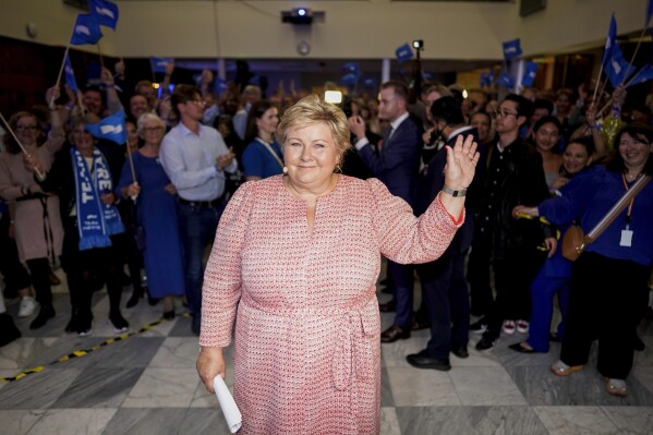 Former prime minister of Norway Erna Solberg waves at Høyre's election vigil at Høyre's House during the municipal election 2023, in Oslo, Norway, Monday, Sept. 11, 2023. (Heiko Junge/NTB Scanpix via AP)