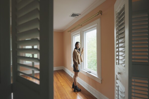 This image released by Neon shows Callina Liang in a scene from "Presence." (Neon via AP)