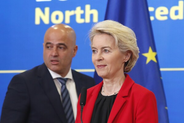 European Commission President Ursula von der Leyen, right and North Macedonia's Prime Minister Dimitar Kovacevski, left, arrive to a news conference, following their meeting at the Government building in Skopje, North Macedonia, on Monday, Oct. 30, 2023. The President of the European Commission, Ursula von der Leyen started her four-day visit to the Western Balkans in North Macedonia, a tour that includes Kosovo, Montenegro, Serbia, and Bosnia and Herzegovina. (AP Photo/Boris Grdanoski)