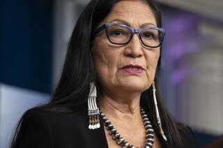 FILE - In this April 23, 2021, file photo, Interior Secretary Deb Haaland speaks during a news briefing at the White House in Washington. On Tuesday, June 22, 2021, Haaland and other federal officials are expected to announce steps that the federal government plans to take to reconcile the legacy of boarding school policies on Indigenous families and communities across the U.S. (AP Photo/Evan Vucci, File)
