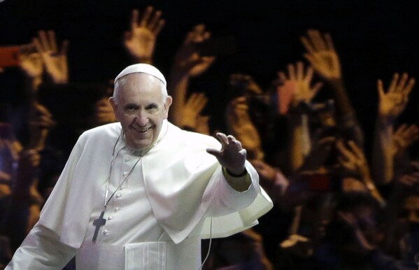 FILE - Pope Francis waves to the crowd during a parade Saturday, Sept. 26, 2015, in Philadelphia. (AP Photo/Matt Rourke, Pool, File)